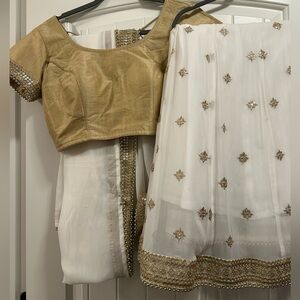 Women’s size Small gold and white Indian saree
